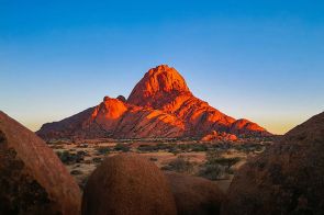 Mountains illuminated at sunrise