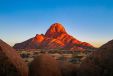 Mountains illuminated at sunrise